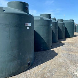 Line of poly tanks for water storage